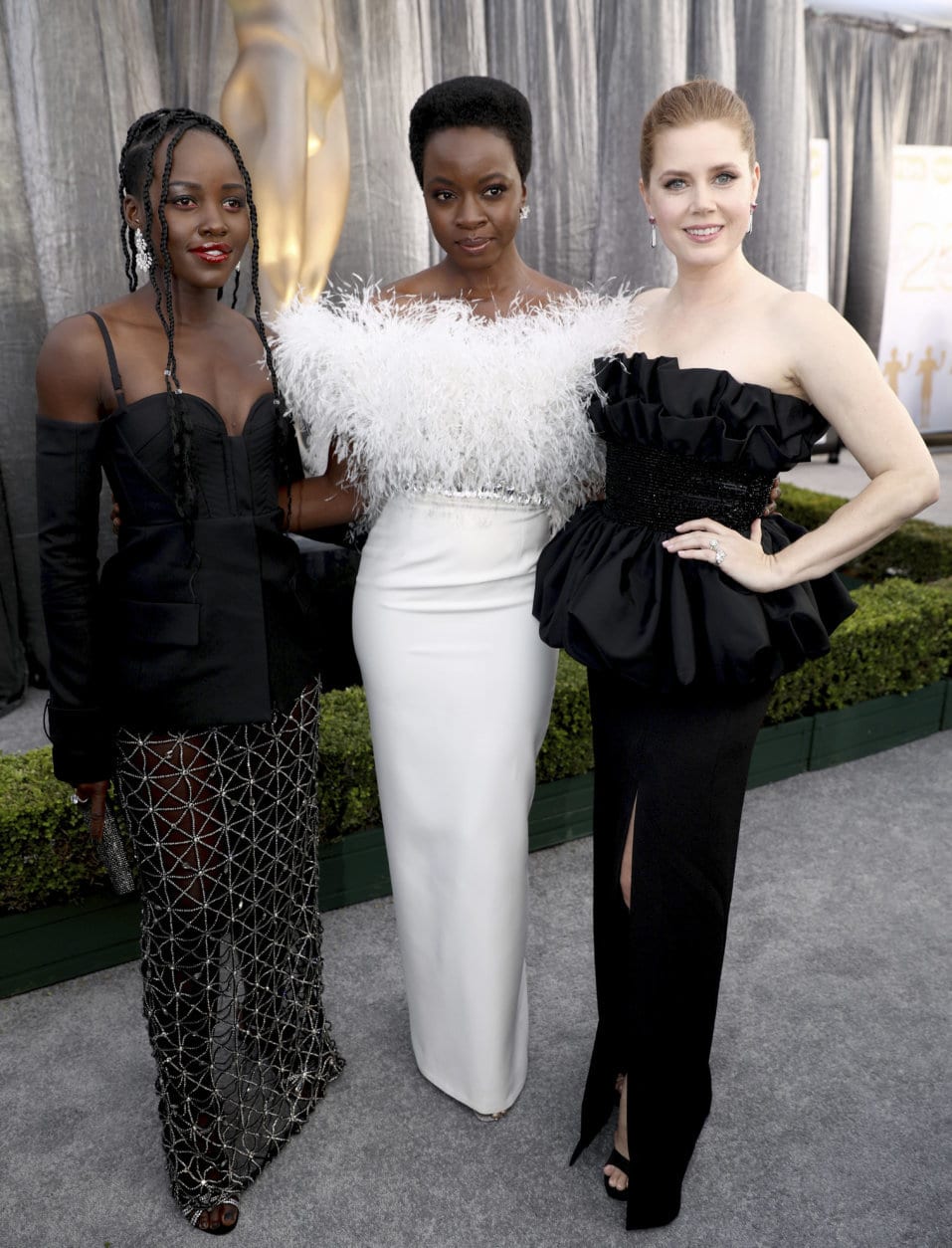 Lupita Nyong'o, from left, Danai Gurira, and Amy Adams arrive at the 25th annual Screen Actors Guild Awards at the Shrine Auditorium &amp; Expo Hall on Sunday, Jan. 27, 2019, in Los Angeles. (Photo by Matt Sayles/Invision/AP)