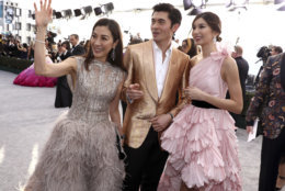 Michelle Yeoh, from left, Henry Golding and Gemma Chan arrive at the 25th annual Screen Actors Guild Awards at the Shrine Auditorium &amp; Expo Hall on Sunday, Jan. 27, 2019, in Los Angeles. (Photo by Matt Sayles/Invision/AP)