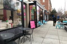 "We went from having thousands of people every day for Zoo Lights in December to having nobody in January," said Yael Krigman, of nearby shop Baked by Yael, while looking around at empty bistro tables. (WTOP/Kristi King)