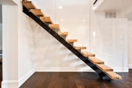 A floating staircase down the basement. (Courtesy Century 21 New Millennium/RealMarkets)