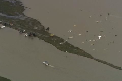 Body recovered after a cargo plane crashes in water near Houston