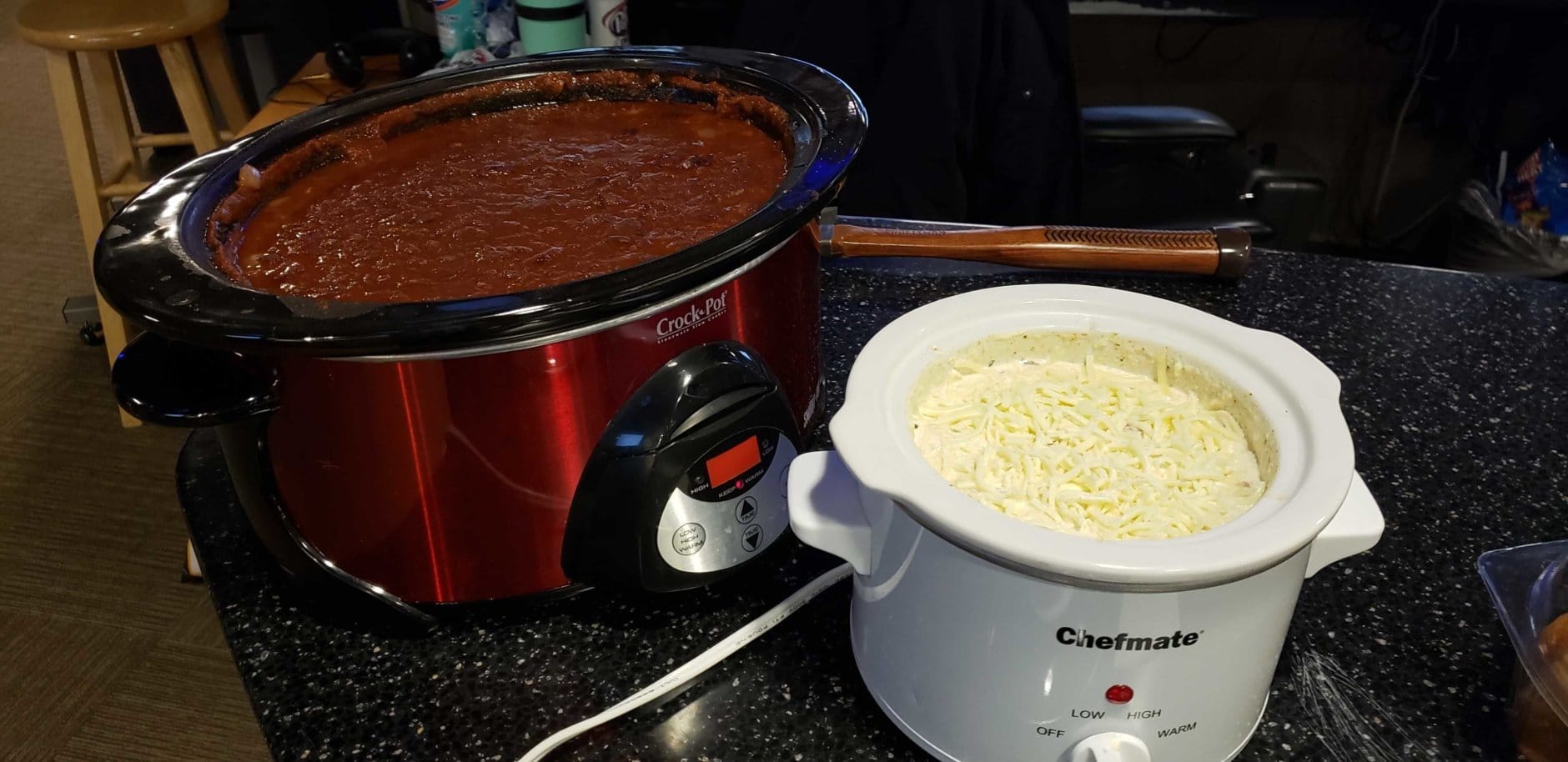Chili and cheese dip stay warm in the crockpot. (WTOP/Brandon Millman) 