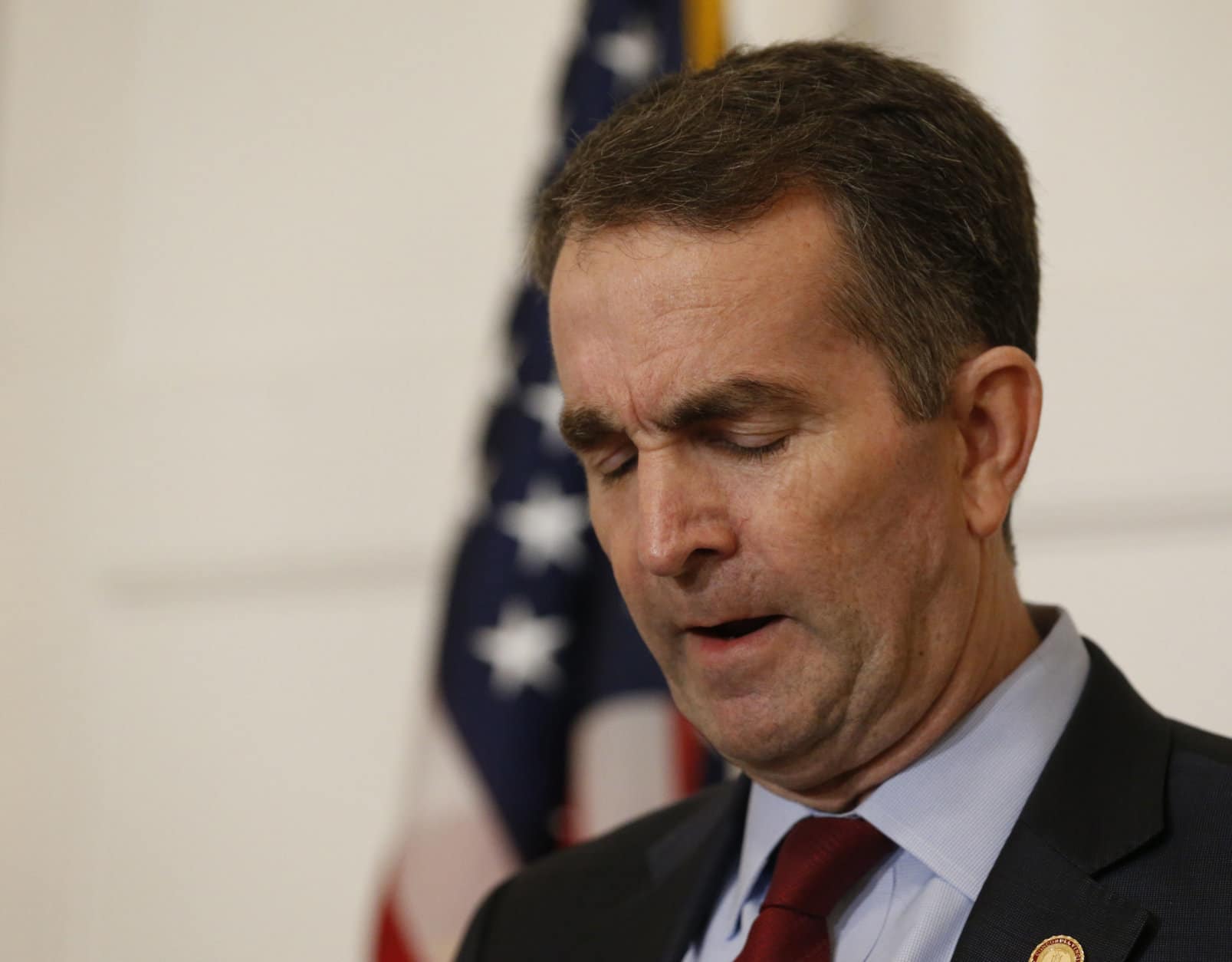 Virginia Gov. Ralph Northam, pauses during a news conference in the Governors Mansion at the Capitol in Richmond, Va., Saturday, Feb. 2, 2019. Northam is under fire for a racial photo that appeared in his college yearbook. (AP Photo/Steve Helber)