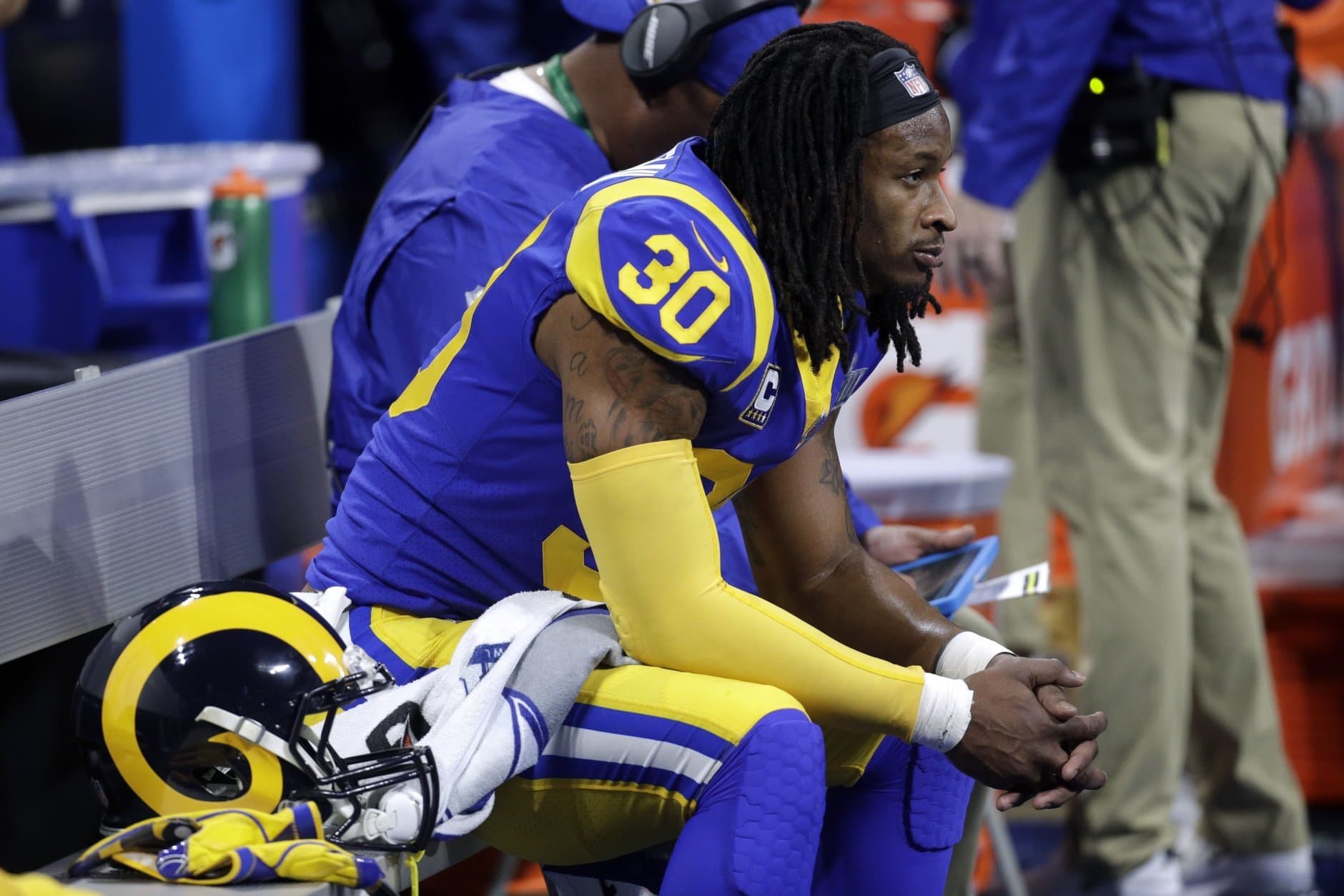 Los Angeles Rams' Todd Gurley II watches from the bench during the first half of the NFL Super Bowl 53 football game against the New England Patriots, Sunday, Feb. 3, 2019, in Atlanta. (AP Photo/Patrick Semansky)