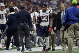 New England Patriots' Patrick Chung (23) leaves the game after he injured his right arm, during the second half of the NFL Super Bowl 53 football game against the Los Angeles Rams, Sunday, Feb. 3, 2019, in Atlanta. (AP Photo/Frank Franklin II)