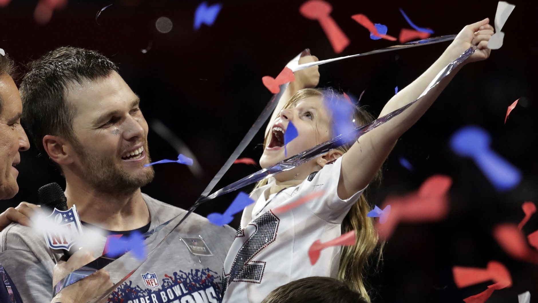 New England Patriots' Tom Brady holds his daughter, Vivian, after the NFL Super Bowl 53 football game against the Los Angeles Rams, Sunday, Feb. 3, 2019, in Atlanta. The Patriots won 13-3. (AP Photo/Lynne Sladky)