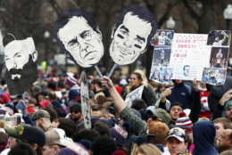 Fans gather on to watch the New England Patriots parade through downtown Boston, Tuesday, Feb. 5, 2019, to celebrate their win over the Los Angeles Rams in Sunday's NFL Super Bowl 53 football game in Atlanta. (AP Photo/Michael Dwyer)