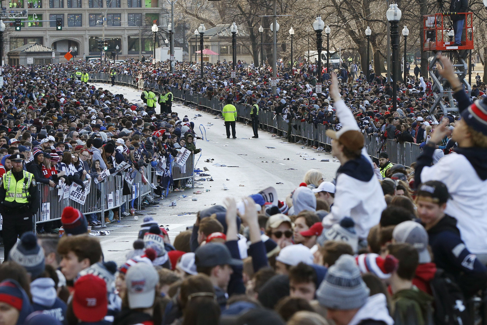 Fans line Tremont Street before the New England Patriots parade through downtown Boston, Tuesday, Feb. 5, 2019, to celebrate their win over the Los Angeles Rams in Sunday's NFL Super Bowl 53 football game in Atlanta. (AP Photo/Michael Dwyer)