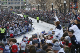 Fans line Tremont Street before the New England Patriots parade through downtown Boston, Tuesday, Feb. 5, 2019, to celebrate their win over the Los Angeles Rams in Sunday's NFL Super Bowl 53 football game in Atlanta. (AP Photo/Michael Dwyer)
