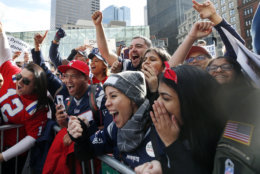 Fans cheer during the New England Patriots victory parade in downtown Boston, Tuesday, Feb. 5, 2019, to celebrate their win over the Los Angeles Rams in Sunday's NFL Super Bowl 53 football game in Atlanta. The Patriots have won six Super Bowl championships. (AP Photo/Elise Amendola)