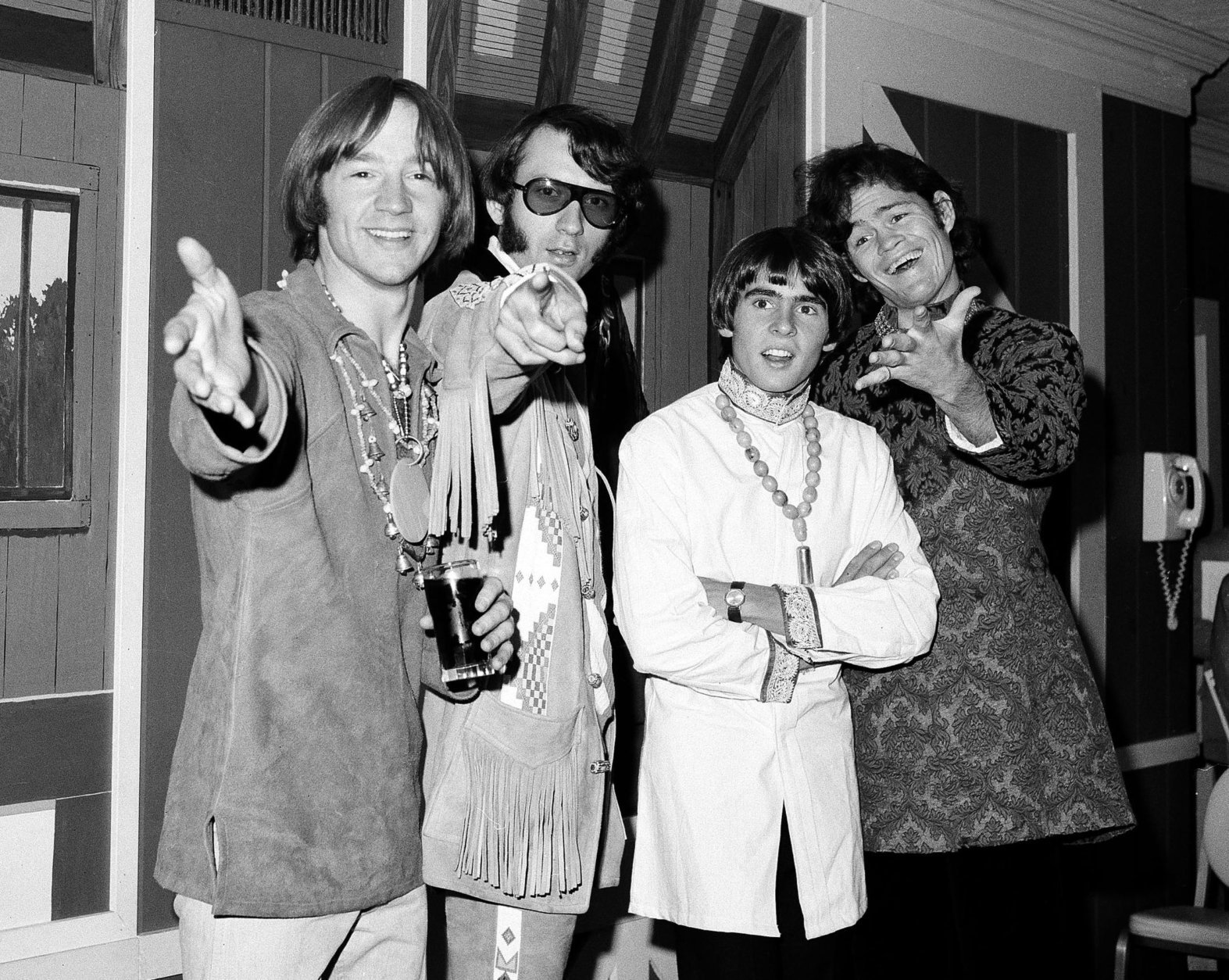 FILE - This July 6, 1967 file photo shows the musical group, The Monkees, from left,  Peter Tork, Mike Nesmith, David Jones, and Micky Dolenz at a news conference at the Warwick Hotel in New York.The Monkees will perform its first live shows since its star Davy Jones died in February. Michael Nesmith, Micky Dolenz, and Peter Tork announced Wednesday, Aug. 8, 2012, that the group will launch a 12-date U.S. tour in November. Jones died of a heart attack on Feb. 29. The group starred in its own NBC television show in 1966 as a made-for-TV band seeking to capitalize on Beatlemania sweeping the world. Jones rocketed to the top of the music charts with The Monkees, captivating audiences with hits including "Daydream Believer" and "I'm a Believer."The tour kicks off Nov. 8 in Escondido, Calif. It wraps on Dec. 2 in New York. It will highlight Jones in the show's multimedia content. (AP Photo/Ray Howard, file)