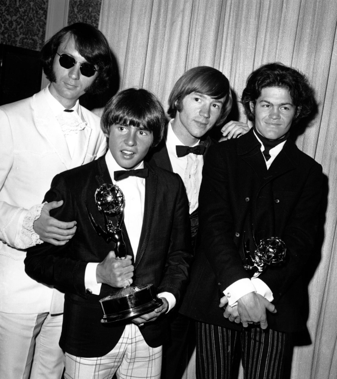 FILE - This June 4, 1967 file photo shows The Monkees posing with their Emmy award at the 19th Annual Primetime Emmy Awards in Calif. The group members are, from left to right, Mike Nesmith, Davy Jones, Peter Tork, and Micky Dolenz. Jones died Wednesday Feb. 29, 2012 in Florida. He was 66. Jones rose to fame in 1965 when he joined The Monkees, a British popular rock group formed for a television show. Jones sang lead vocals on songs like "I Wanna Be Free" and "Daydream Believer."     (AP Photo, File)