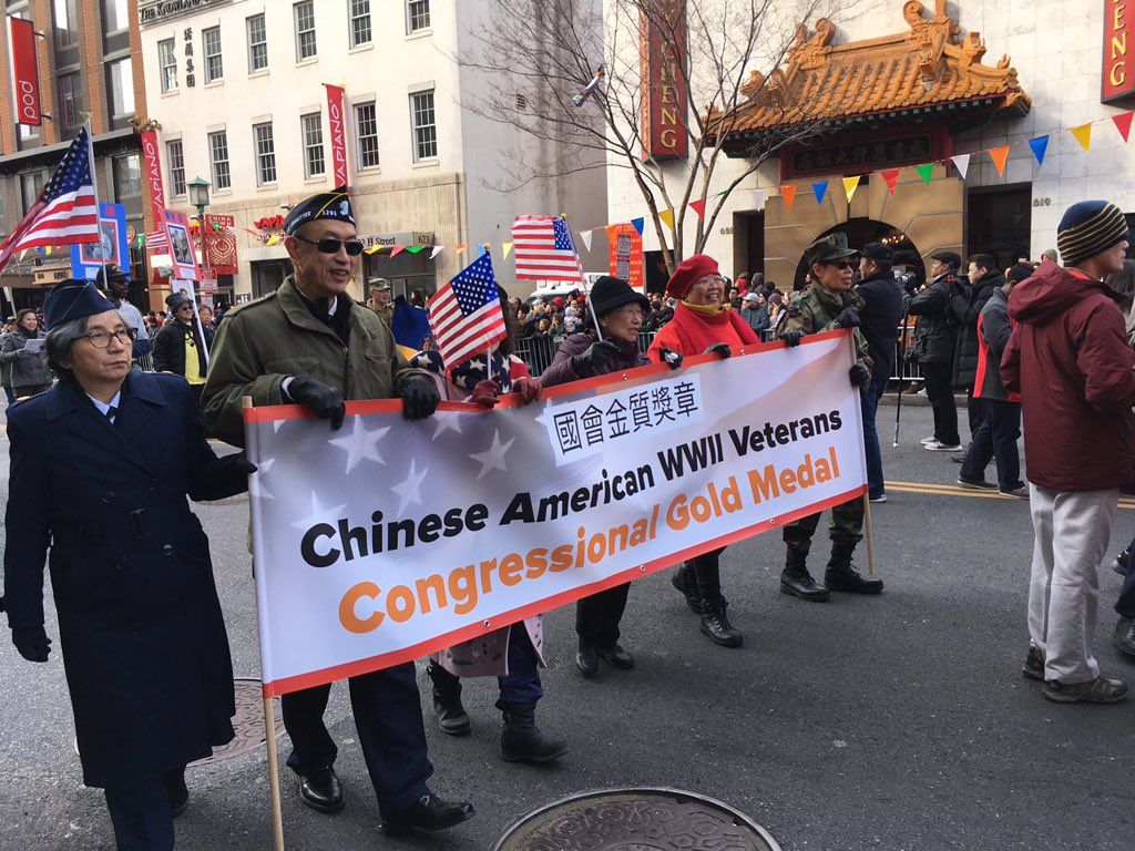 Parade marchers remember Chinese American Veterans who served in World War II. (WTOP/Liz Anderson) 