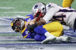 ATLANTA, GA - FEBRUARY 03:  Dont'a Hightower #54 of the New England Patriots sacks Jared Goff #16 of the Los Angeles Rams in the first half during Super Bowl LIII at Mercedes-Benz Stadium on February 3, 2019 in Atlanta, Georgia.  (Photo by Elsa/Getty Images)