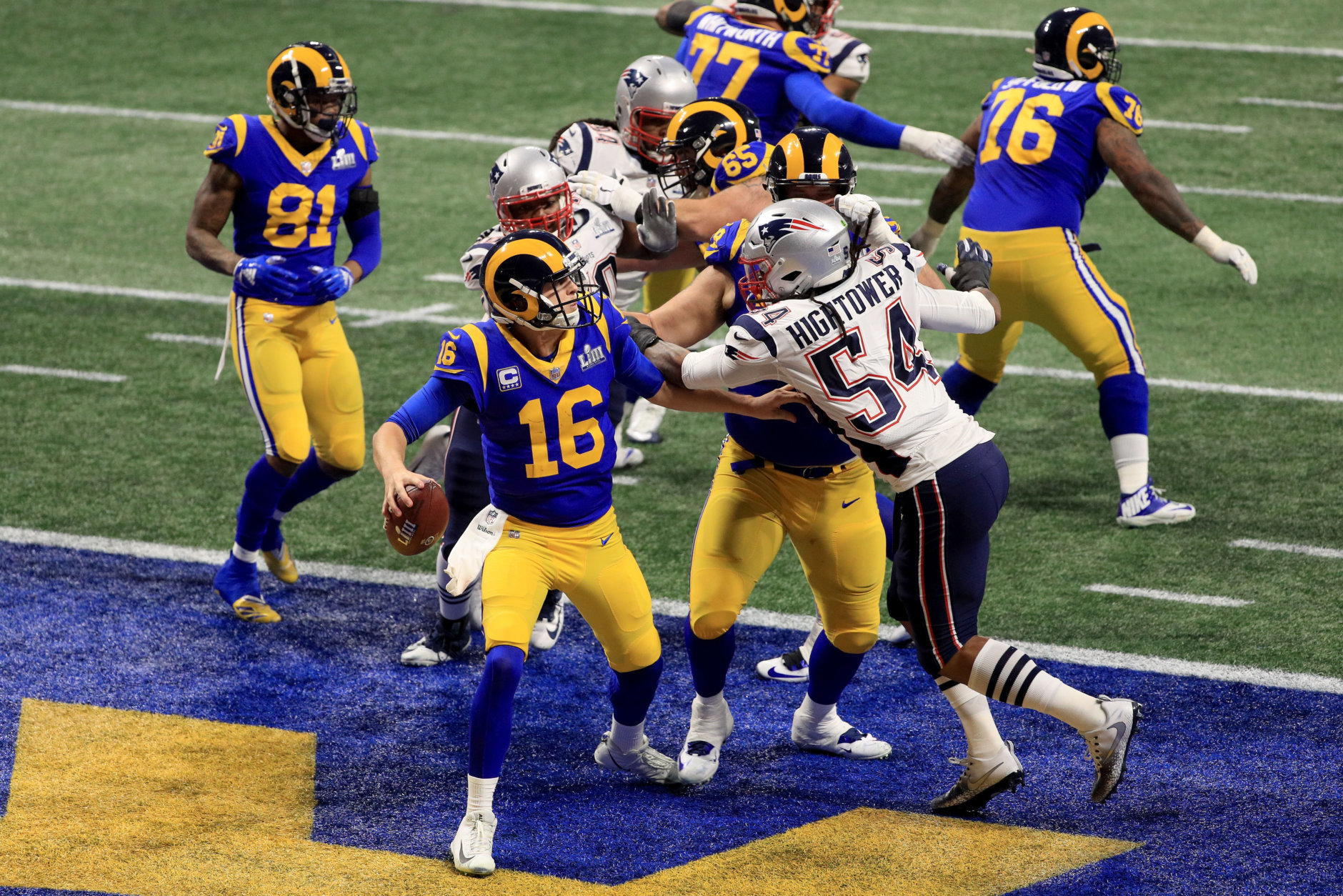 ATLANTA, GA - FEBRUARY 03:  Jared Goff #16 of the Los Angeles Rams is pressured by Dont'a Hightower #54 of the New England Patriots in the second half during Super Bowl LIII at Mercedes-Benz Stadium on February 3, 2019 in Atlanta, Georgia.  (Photo by Mike Ehrmann/Getty Images)