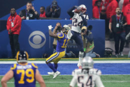ATLANTA, GA - FEBRUARY 03:  Stephon Gilmore #24 of the New England Patriots makes an interception in the fourth quarter during Super Bowl LIII against the Los Angeles Rams at Mercedes-Benz Stadium on February 3, 2019 in Atlanta, Georgia.  (Photo by Elsa/Getty Images)