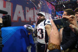 ATLANTA, GEORGIA - FEBRUARY 03: Nate Ebner #43 of the New England Patriots celebrates with the Vince Lombardi Trophy after his teams 13-3 win over the Los Angeles Rams during Super Bowl LIII at Mercedes-Benz Stadium on February 03, 2019 in Atlanta, Georgia. (Photo by Maddie Meyer/Getty Images)