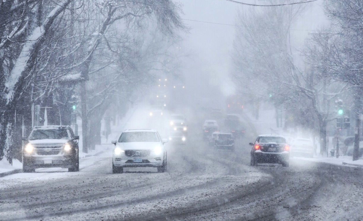 Drivers make their way through dangerous conditions in D.C. (WTOP/Dave Dildine)