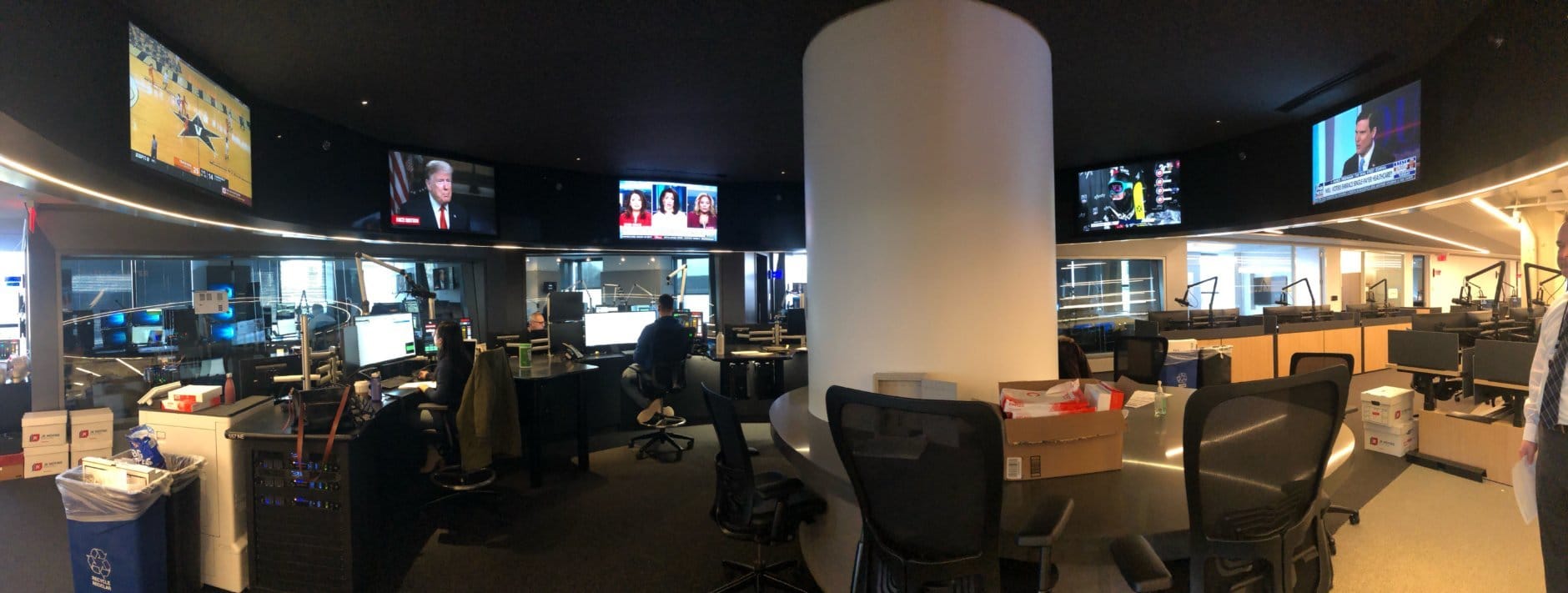 A panoramic view of editing stations in the middle of the WTOP newsroom. (WTOP/Sarah Beth Hensley)