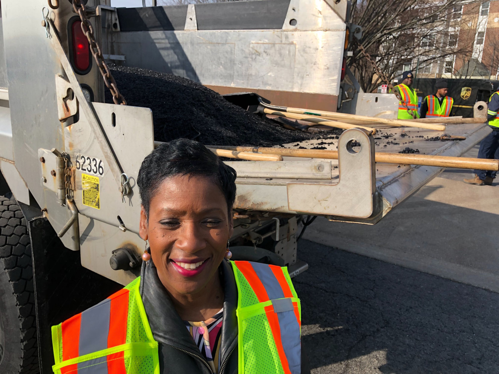 Paulette Jones, of the Prince George's County Department of Public Works and Transportation, said, "We actually have been filling (potholes) throughout the season, but now we're doing what we call our 'blitz,' because the weather is cooperating and this is a wonderful opportunity for us to be out here." (WTOP/Kristi King)