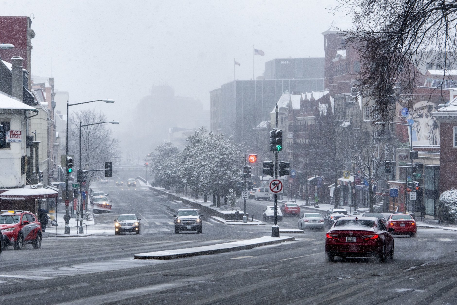 A view southbound on Connecticut Avenue toward Dupont Circle. The Washington Monument would normally be visible in the distance from this spot. (WTOP/Alejandro Alvarez)