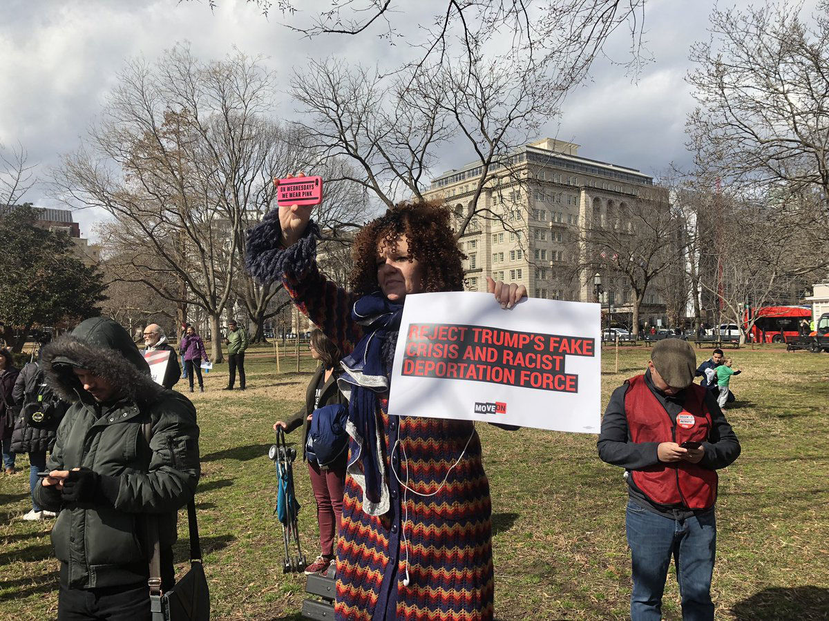Demonstrators protest President Trump's national emergency declaration across the street from the White House Feb. 18, 2019. (WTOP/Mike Murillo)