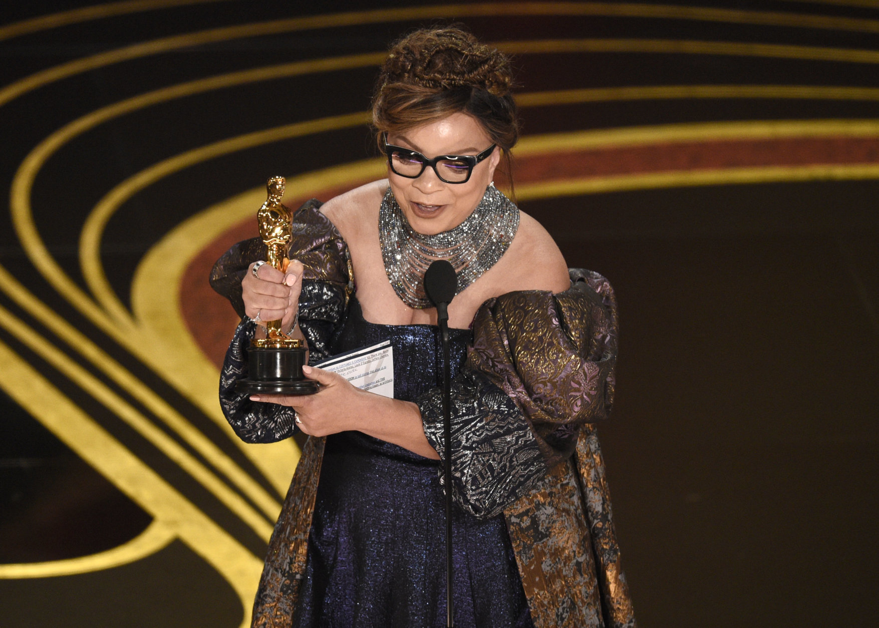 Ruth E. Carter accepts the award for best costume design for "Black Panther" at the Oscars on Sunday, Feb. 24, 2019, at the Dolby Theatre in Los Angeles. (Photo by Chris Pizzello/Invision/AP)