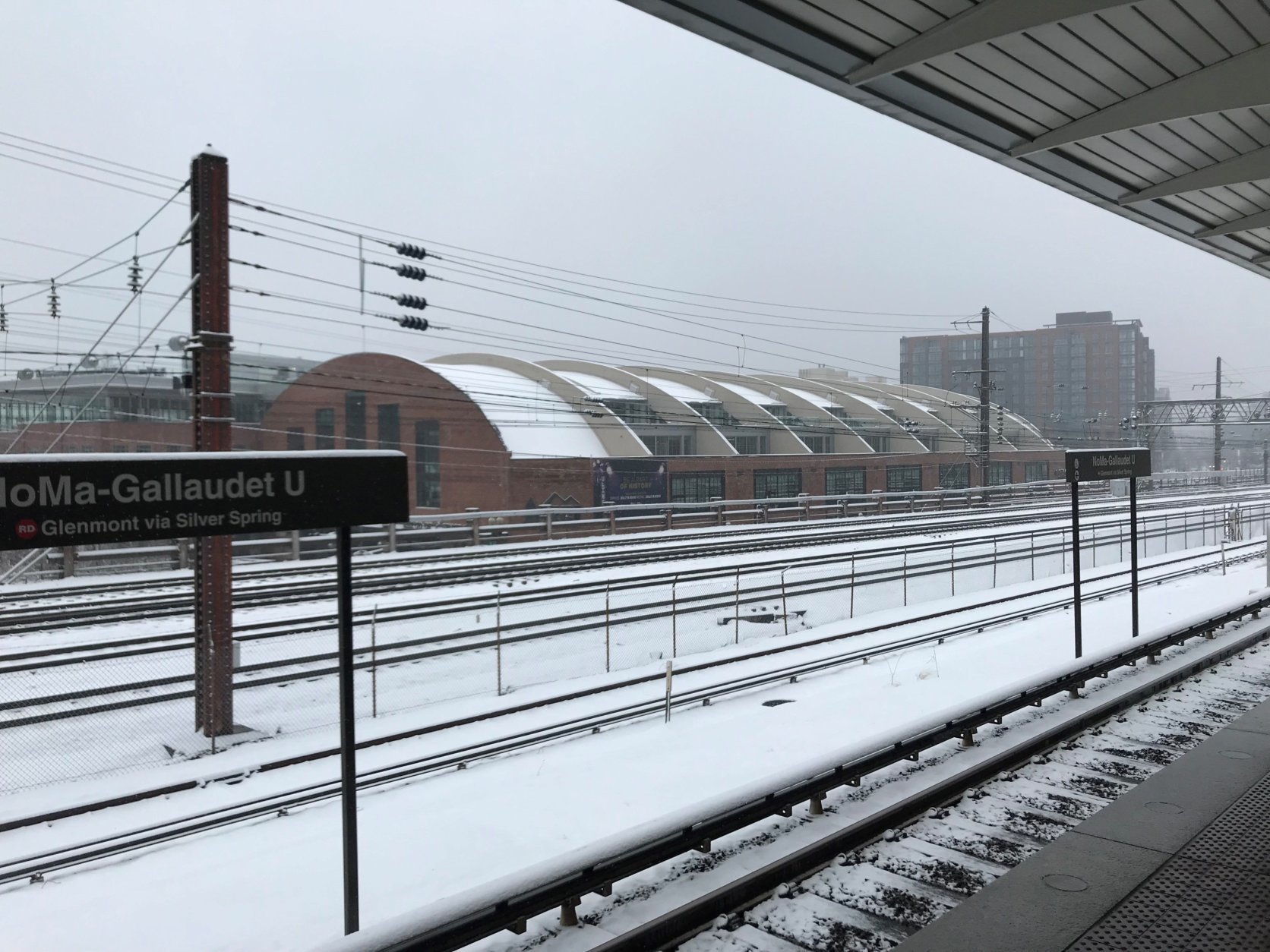 The NoMa-Gallaudet Metro station got a coating of snow Wednesday. (WTOP/Chris Cichon)