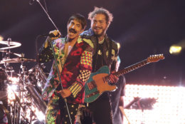Anthony Kiedis, left, of Red Hot Chili Peppers, and Post Malone perform a medley at the 61st annual Grammy Awards on Sunday, Feb. 10, 2019, in Los Angeles. (Photo by Matt Sayles/Invision/AP)