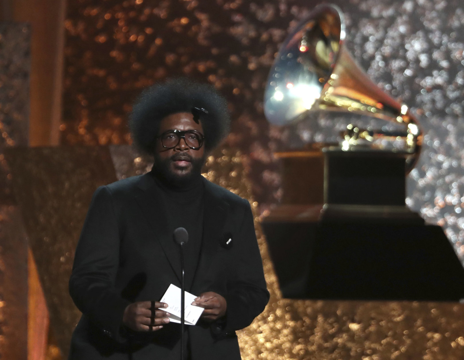 Questlove presents an award at the 61st annual Grammy Awards on Sunday, Feb. 10, 2019, in Los Angeles. (Photo by Matt Sayles/Invision/AP)