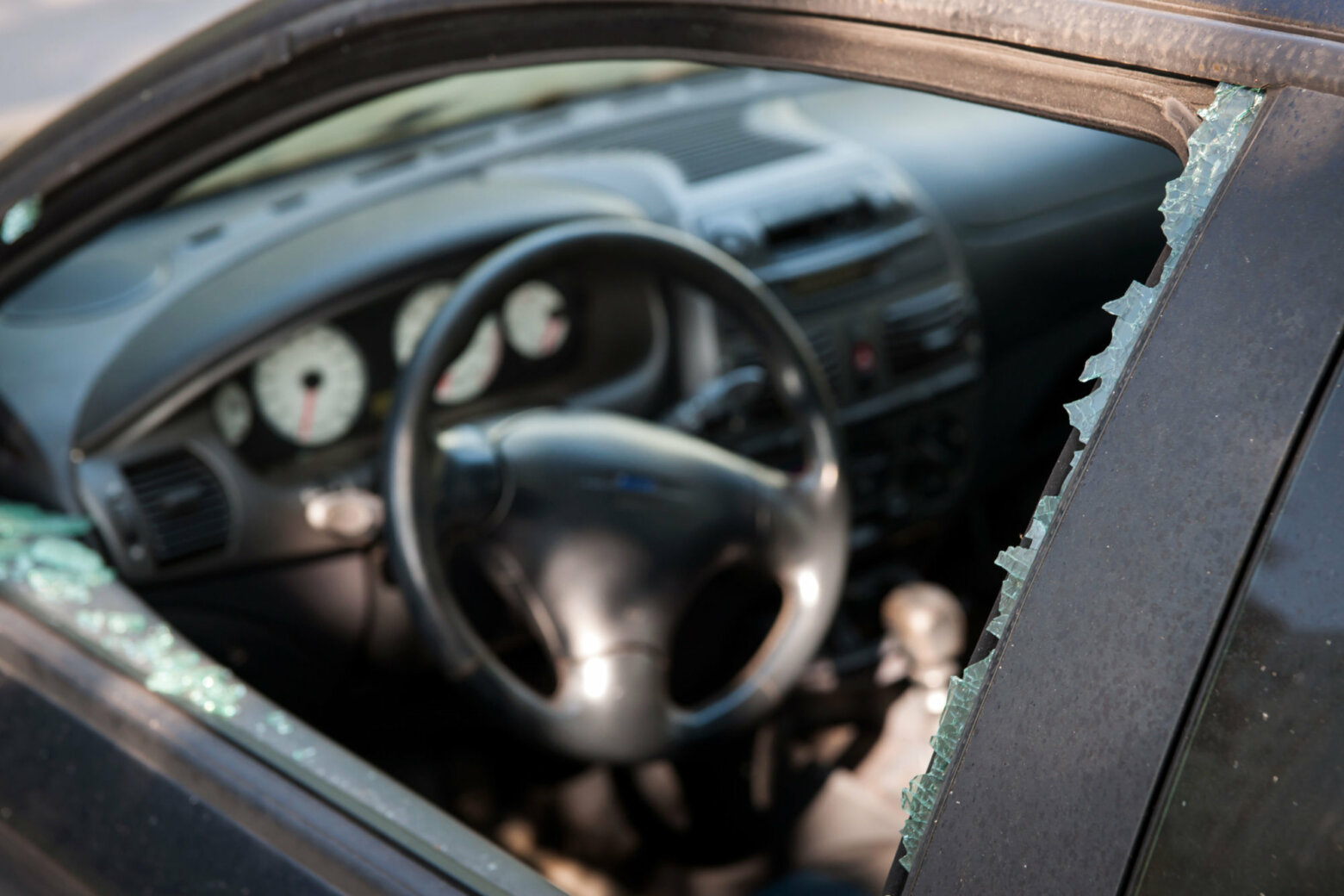 Stock image of a car with a broken window
