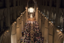 Yogis strike a pose Wednesday night at the Washington National Cathedral. About 1,200 showed up for the sold-out yoga-and-meditation night, which is part of the week's "Seeing Deeper" events. (Courtesy Washington National Cathedral/Danielle E.Thomas)