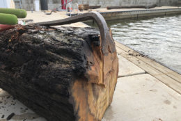 Multiple tools are need to break up wood into pieces in manageable enough sizes to be lifted from the water.(WTOP/Krist King)