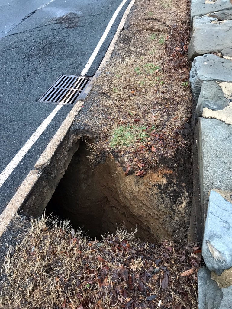 The National Park Service said the sinkhole appeared to be caused by a broken stormwater pipe below ground. The 10-feet-deep sinkhole caused the Park Service to close the parkway in both directions earlier Friday. (Courtesy National Park Service)