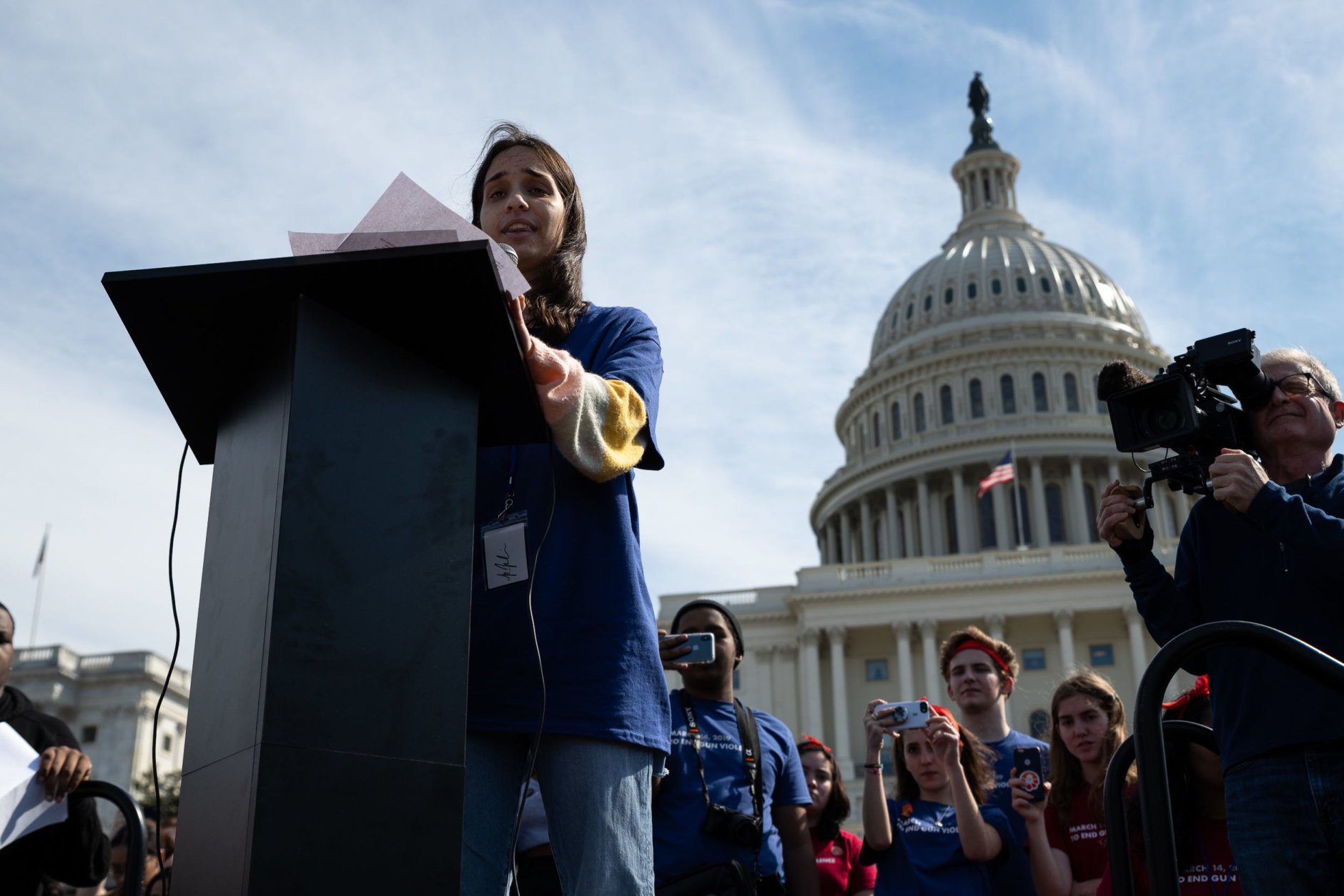 Dani MIller, founder and co-president of MoCo Students for Change, addresses students outside the Capitol after a mass walkout from classes on Thursday. (WTOP/Alejandro Alvarez)