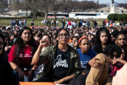 Students from Maryland, Virginia and D.C. joined up for an outdoor rally in the shadow of the Capitol rotunda, emboldened by a new Democratic majority in the House. (WTOP/Alejandro Alvarez)