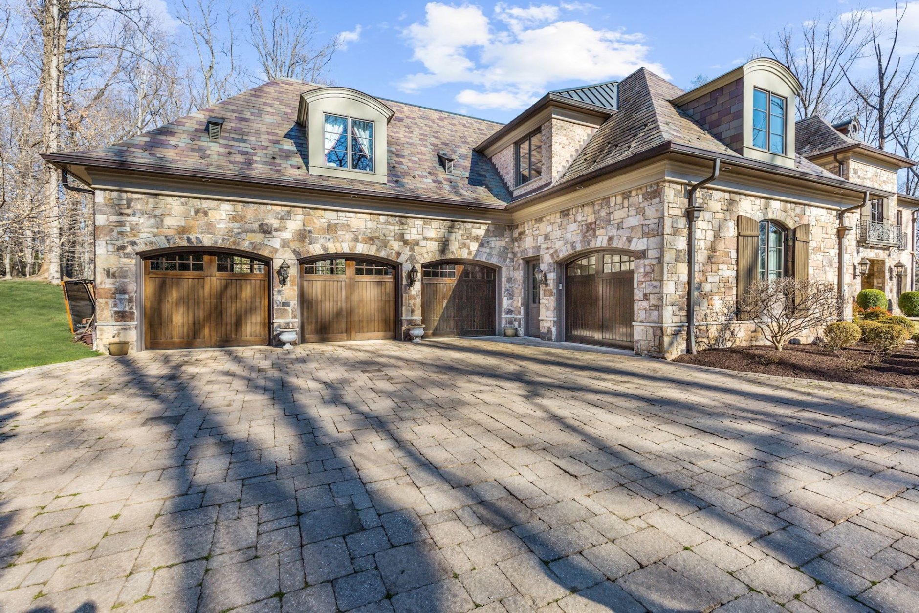 The home features a four-car garage. (Courtesy Washington Fine Properties)