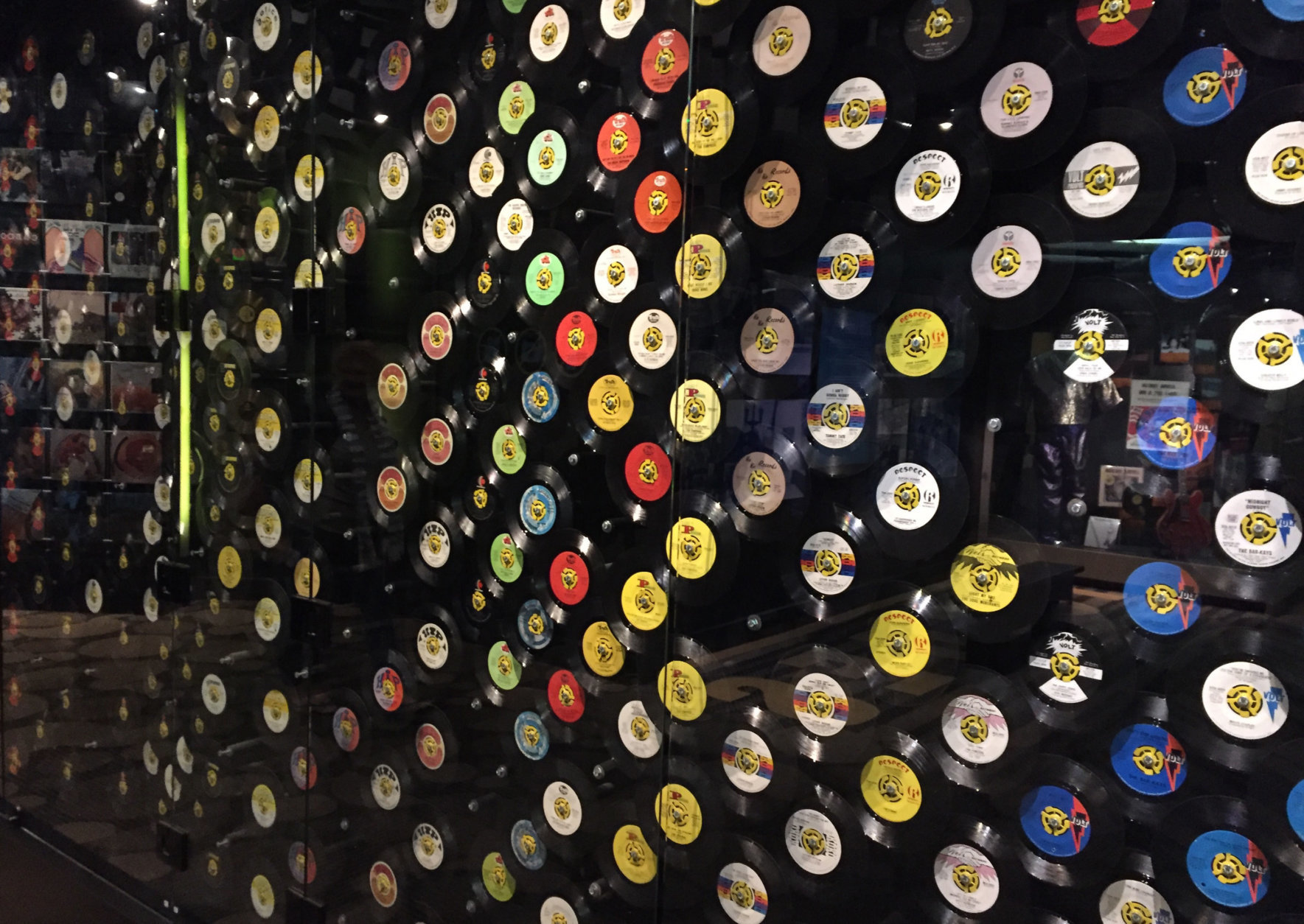 This March 8, 2017 photo shows a display of 45 RPM records at the Stax Museum of American Soul Music in Memphis, Tenn. The Stax recording studio’s roster of stars included Otis Redding, Isaac Hayes and the Staple Singers. Stax eventually went bankrupt but the museum showcases everything from costumes to cars to walls of hit records. (AP Photo/Beth J. Harpaz)