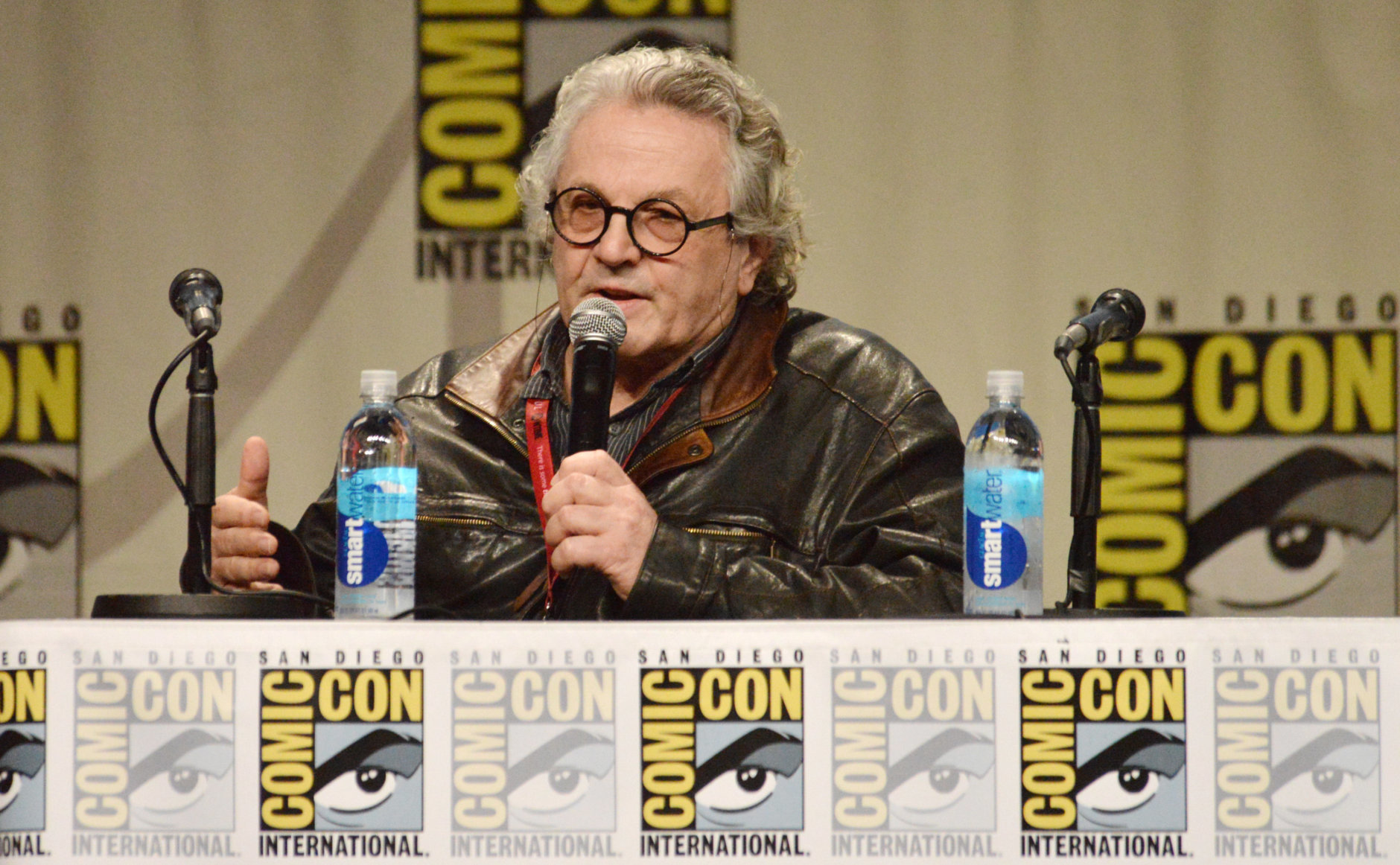 FILE - This July 26, 2014 file photo shows director George Miller speaking at the Warner Bros. Pictures panel for "Mad Max: Fury Road" on Day 3 of Comic-Con International in San Diego. The film releases in the U.S. on May 15, 2015. (Photo by Richard Shotwell/Invision/AP, File)