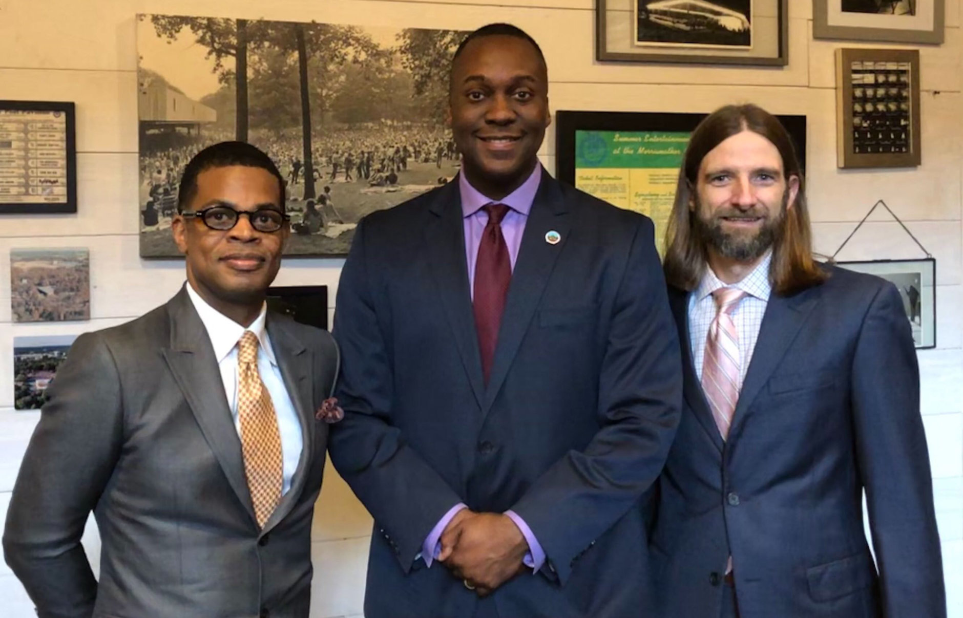 Darin Atwater, director of Soulful Symphony, with Howard County Executive Calvin B. Ball III and Downtown Columbia Arts and Culture Commission  Executive Director Ian Kennedy. (WTOP/Kristi King)