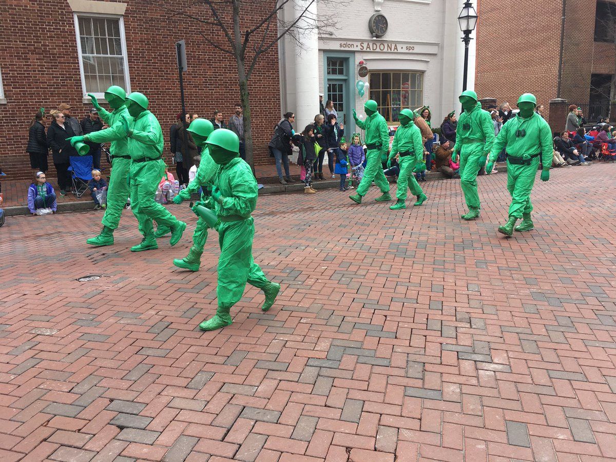 A group dressed as little green army men for the St. Patrick's Day parade in Annapolis. (WTOP/Liz Anderson)