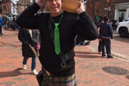 Bucky plays with the Chesapeake Caledonian Pipes and Drums. He came out in festive attire complete with a green tie made of beads. (WTOP/Liz Anderson)