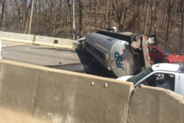 A listener photo shows fuel leaking from the top of the tanker on March 28. Officials say no fuel made it into the Potomac River below. (Courtesy Brian Starling)