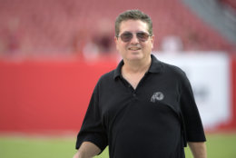 Washington Redskins owner Daniel Snyder watches warmups on the field before an NFL preseason football game against the Tampa Bay Buccaneers Thursday, Aug. 31, 2017, in Tampa, Fla. (AP Photo/Phelan M. Ebenhack)