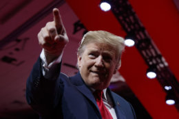 President Donald Trump points to the cheering audience as he arrives to speak at Conservative Political Action Conference, CPAC 2019, in Oxon Hill, Md., Saturday, March 2, 2019. (AP Photo/Carolyn Kaster)