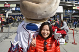 WASHINGTON, DC - MARCH 28: A fan takes a photo with the Washington Nationals Racing Presidents before the game between the New York Mets and Washington Nationals on Opening Day at Nationals Park on March 28, 2019 in Washington, DC. (Photo by Patrick McDermott/Getty Images)