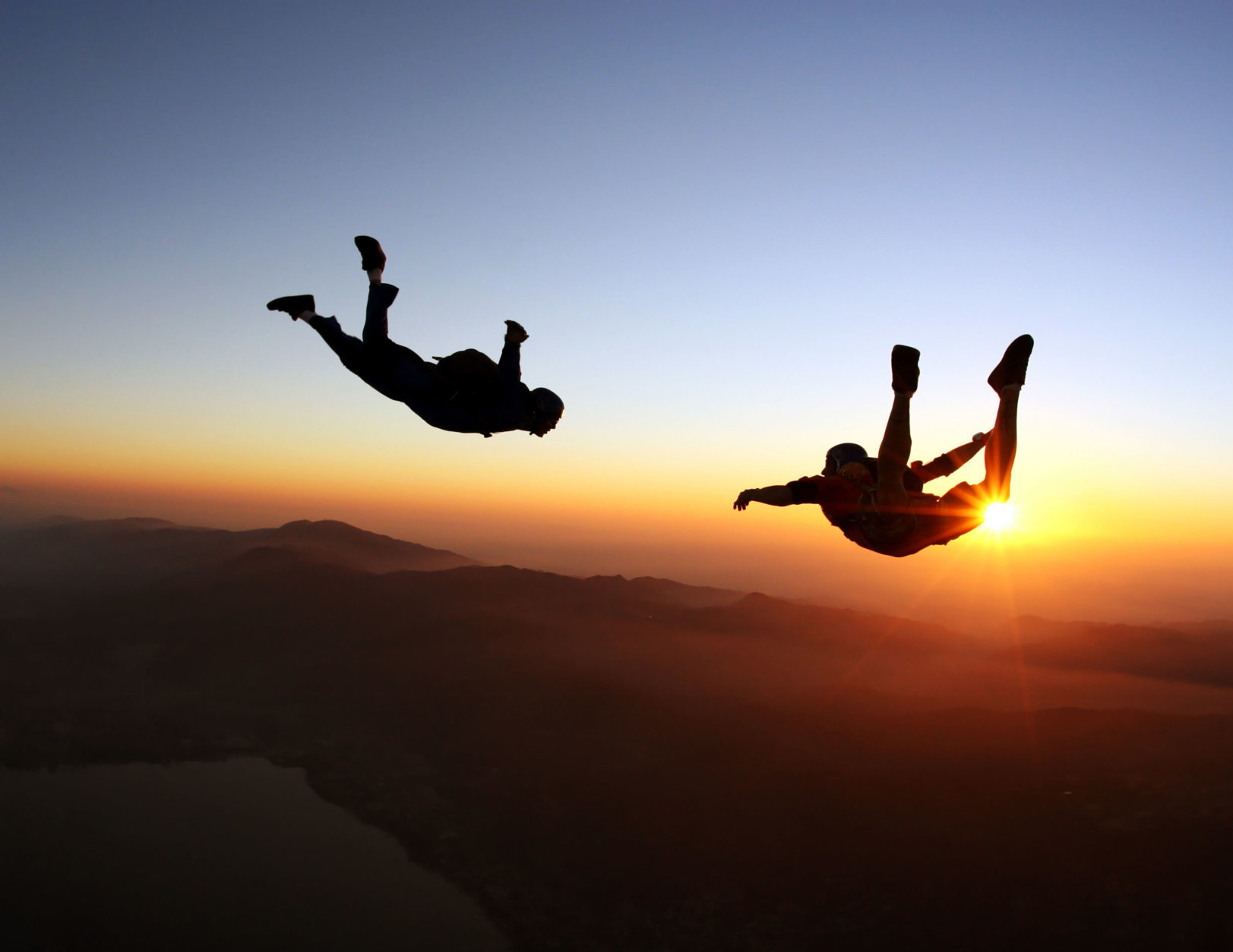 Amazing skydiving at the sunset