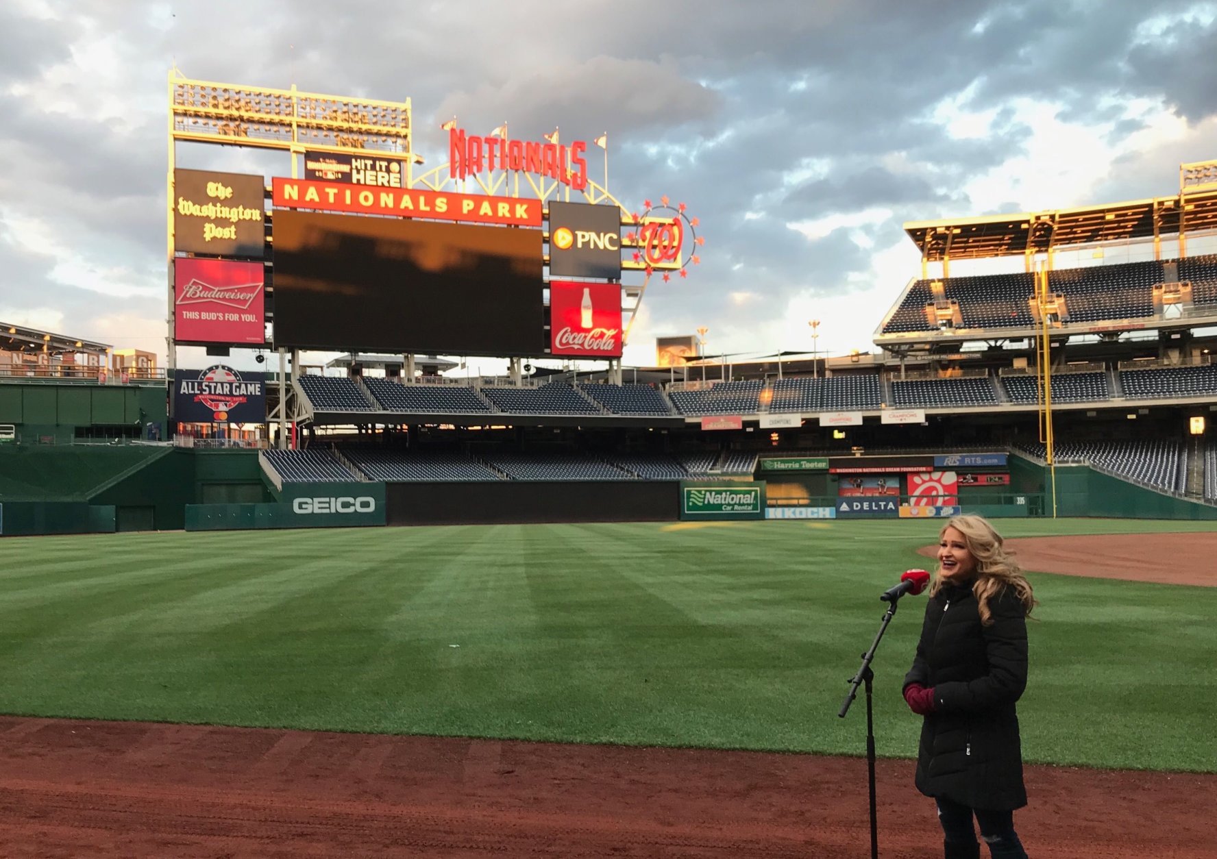 Another woman performs the national anthem during open auditions at Nationals Park. (WTOP/Michelle Basch)