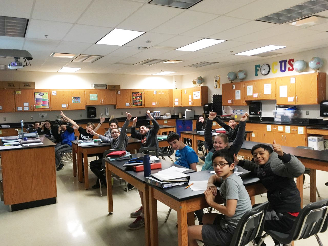 Students at Lunsford Middle School celebrate after learning they won first prize in the 2019 Clicks for Kids competition. (Courtesy Carrie Simms)