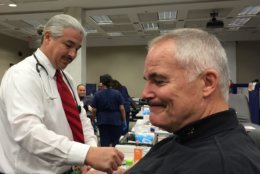 Police Chief Tom Manger donates blood at a blood drive named in honor of Officer Noah Leotta. (WTOP/Kate Ryan)